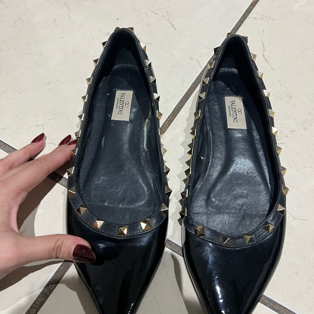 Valentino Garavani Black Flats with Gold Accents
